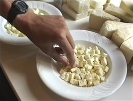 Some of the free cheese samples at the Wensleydale Dairy Visitor Centre Cheese Shop - and if you can read the time on Ryan's watch that would be very helpful!